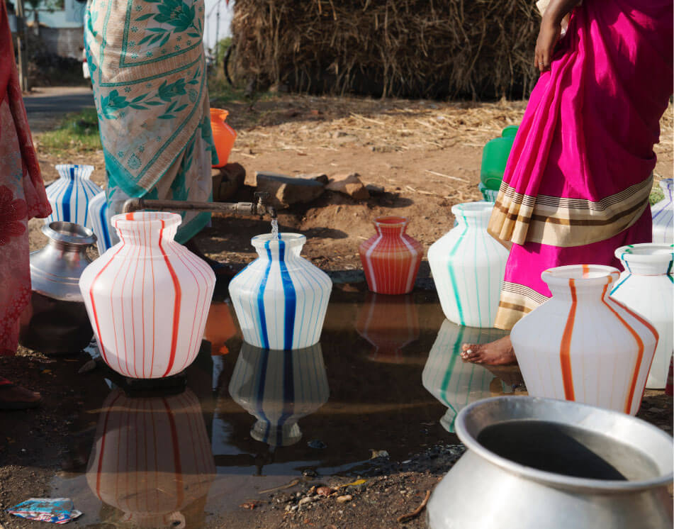 People in rural areas must collect water every morning, but the supply is often not reliable.